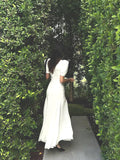 Plataz Gentle Temperament Ken Bean The Same Spring 2024 White Deep V Bow Tidial Sleeve Dress