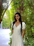 Plataz Gentle Temperament Ken Bean The Same Spring 2024 White Deep V Bow Tidial Sleeve Dress